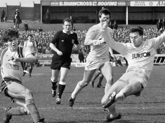 John Sheridan in action for Leeds against Latics at Springfield Park in 1987.