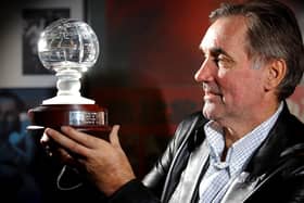 George Best with his Hall of Fame trophy during his visit to the National Football Museum at Deepdale in 2003