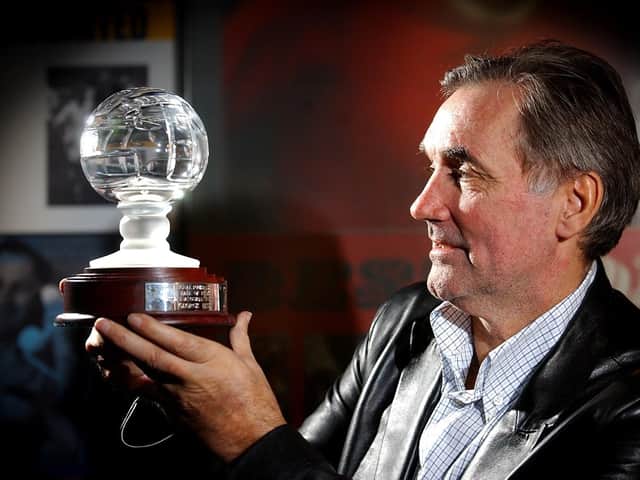 George Best with his Hall of Fame trophy during his visit to the National Football Museum at Deepdale in 2003