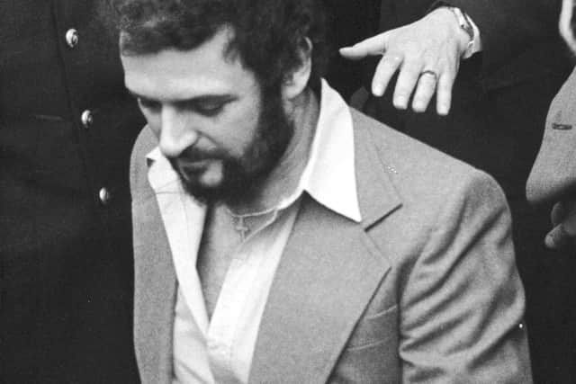 British serial killer Peter Sutcliffe, a.k.a. 'The Yorkshire Ripper,' in police custody, 1983.