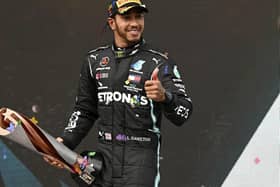 Lewis Hamilton on the winner's podium at the Turkish Grand Prix