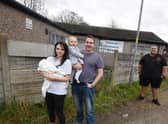 Courtney Bampton with children Tommy and Lilly-Mae, Coun Jones and Ben Charlton of Bryn Support Centre