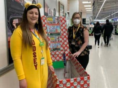 Charlene Frodsham, community champion at Asda in Newtown, and Maureen Holcroft, from Daffodils Dreams, at the supermarket collection point