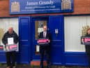 James Grundy, pictured with resident campaigners, has launched a petition against the proposed route