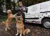 Vicki Jolley with some of the dogs she takes for regular walks