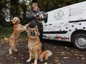 Vicki Jolley with some of the dogs she takes for regular walks