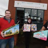 Bryn Coun Steve Jones with volunteer Michelle Thomson and operations manager Ben Charlton at Bryn Support Centre, launch their Christmas Toy Appeal.