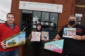 Bryn Coun Steve Jones with volunteer Michelle Thomson and operations manager Ben Charlton at Bryn Support Centre, launch their Christmas Toy Appeal.