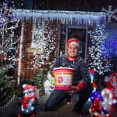 Mike Denaro with the spectacular lights display raising money for the hospice