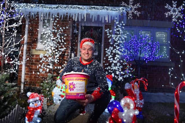 Mike Denaro with the spectacular lights display raising money for the hospice