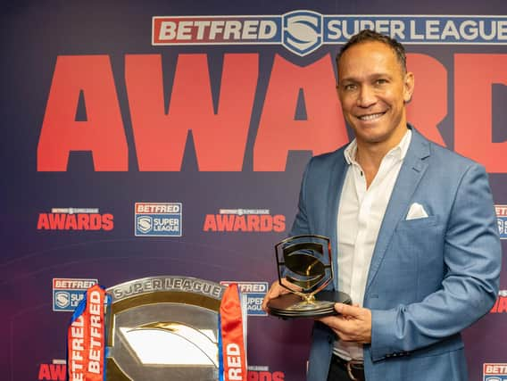 Adrian Lam with the Coach of the Year prize and the League Leaders' Shield