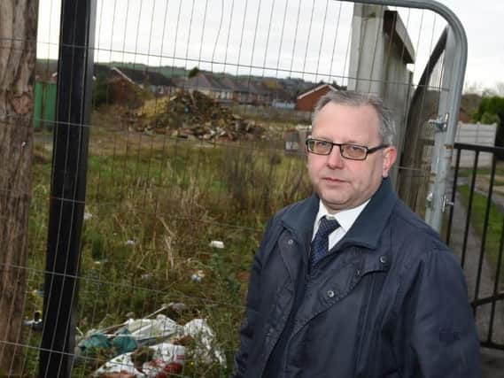 Coun Michael Winstanley at the former recycling centre site