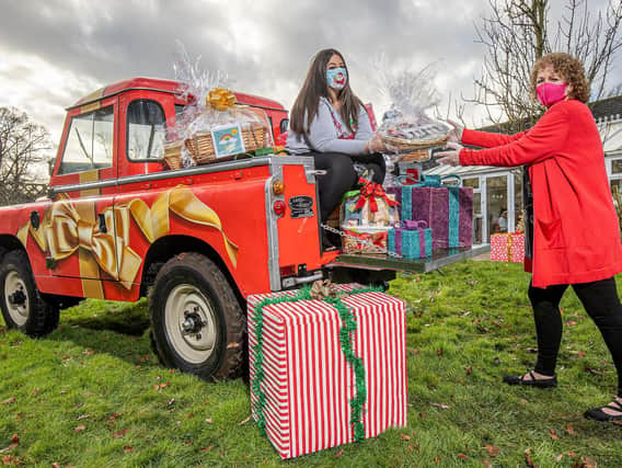 National Lottery-winning festive elves have been bringing some early Christmas cheer to carers.