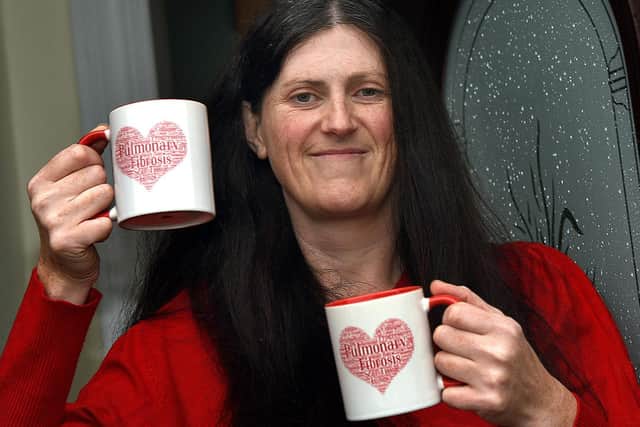 Louise with the awareness mugs