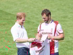 Sean O'Loughlin presents Prince Harry with an England shirt