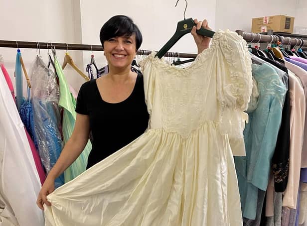 Wigan and Leigh Hospice retail co-ordinator Jenny McAvoy with the dress