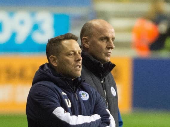 Paul Cook on the touchline with Leam Richardson