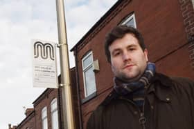Coun Adam Marsh at one of the bus stops affected by the bus service change on Bradley Lane, Standish