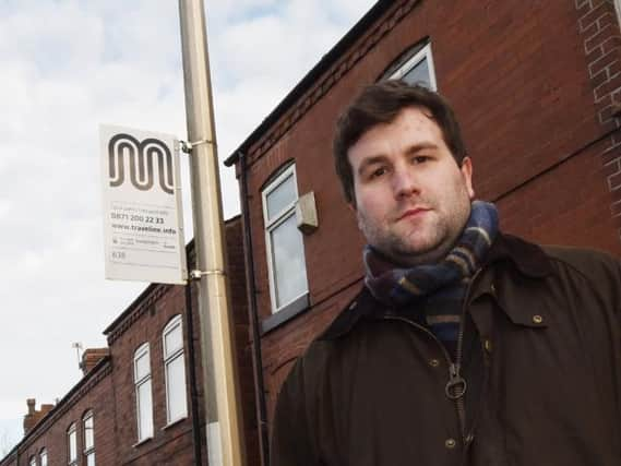 Coun Adam Marsh at one of the bus stops affected by the bus service change on Bradley Lane, Standish