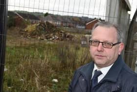 Coun Michael Winstanley at the former recycling centre site