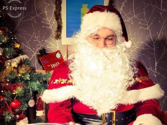 A film company is doing virtual messages from Santa in his grotto