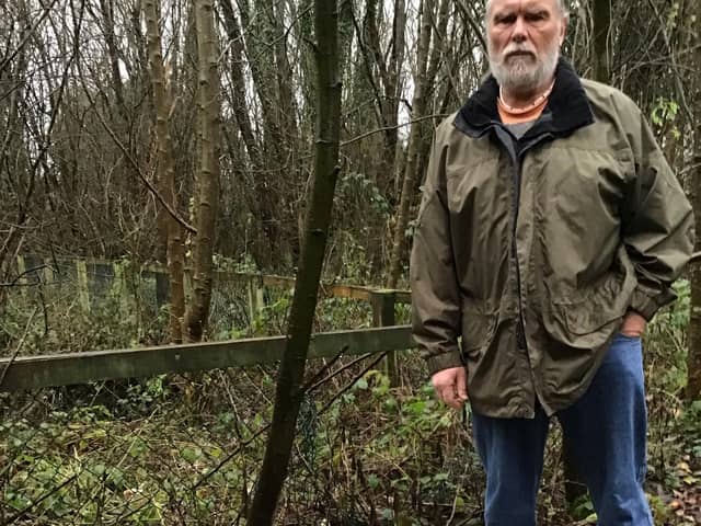 Coun Vickers with some of the fly-tipped rubbish