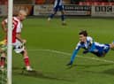 Ollie Crankshaw heads home the Latics equaliser at Fleetwood