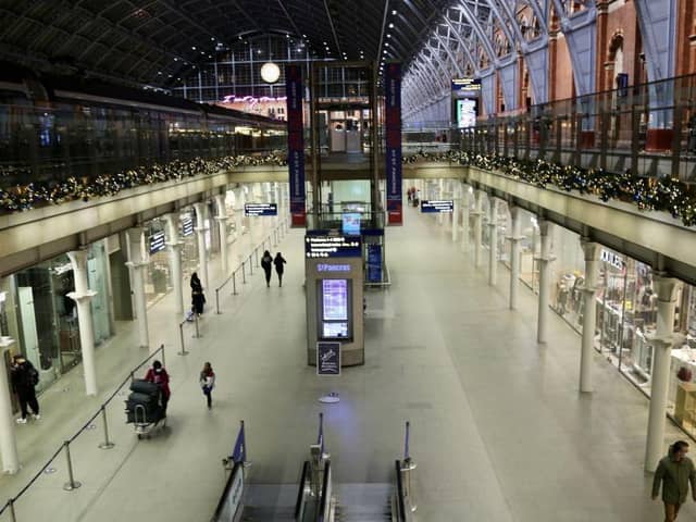 Passengers arrive at St Pancras International train station in London, United Kingdom on December 20, 2020 as several European countries ban travel to and from the UK due to fears over the emergence of a new variant of coronavirus.
