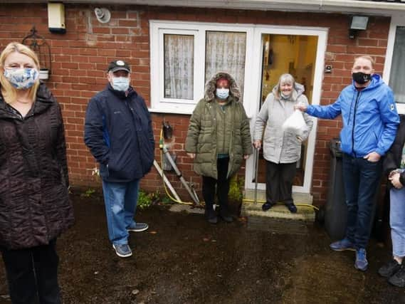 Pictured from left, Gill Foster from Standish Voice with coun Ray Whittingham, coun Debbie Parkinson, Standish resident Joan Snape, Kirsty Norris and Kevin Bath, both from Hinds Head pub, Charnock Richard