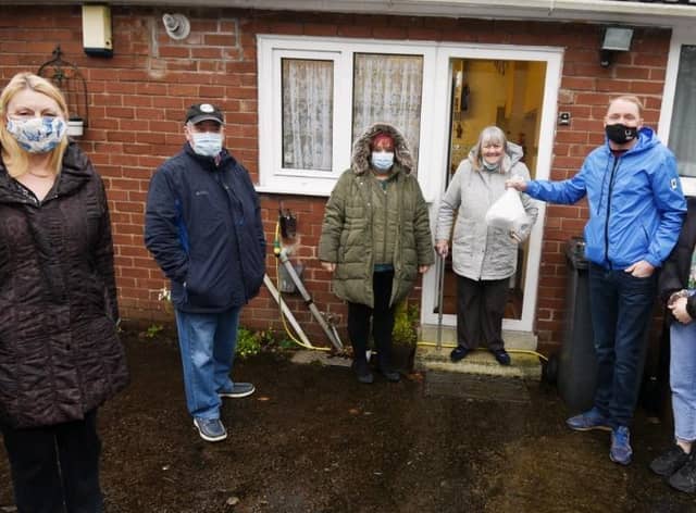 Pictured from left, Gill Foster from Standish Voice with coun Ray Whittingham, coun Debbie Parkinson, Standish resident Joan Snape, Kirsty Norris and Kevin Bath, both from Hinds Head pub, Charnock Richard