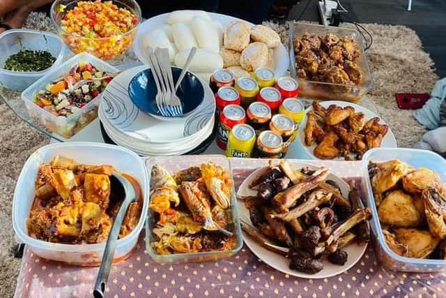 A table laden with Zimbabwean Christmas dishes