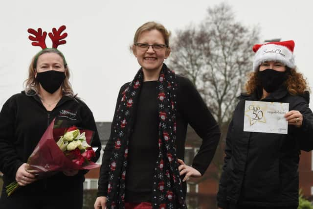 Alison Parker celebrates with Slimming World consultants Nicola Kiggin and Sam Fowler