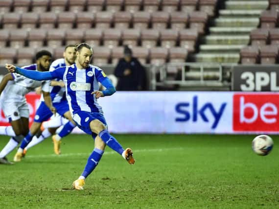 Will Keane puts Latics ahead from the penalty spot