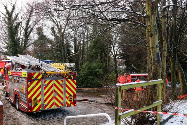The fire service dealing with the incident off Hooten Lane. Photo: Wendy Grehan