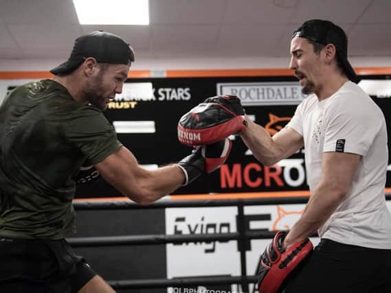 James Moorcroft training with coach Ant Crolla. Picture courtesy of OLM Photography