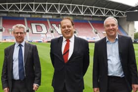Can you name all three co-administrators in charge of Wigan Athletic (question 11)?