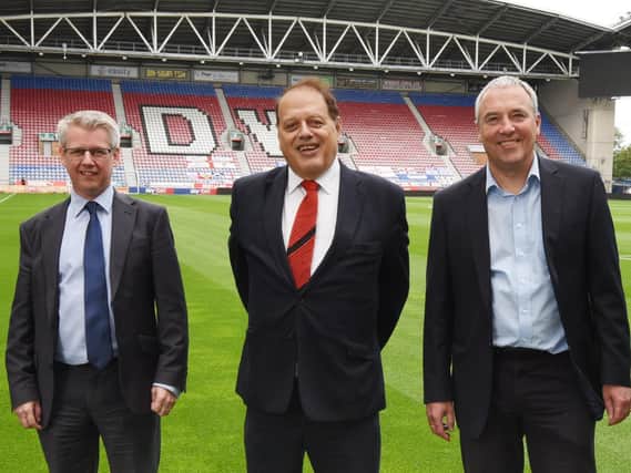Can you name all three co-administrators in charge of Wigan Athletic (question 11)?