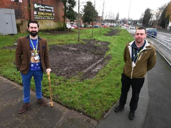 Coun Watson and Hodgkinson, right, near one of the land subsidence points on Mealhouse Lane