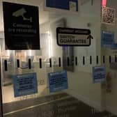 A bank branch adorned with stickers by XR Wigan protestors