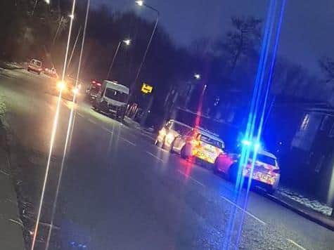 Two men are being questioned by the police after a man was stabbed in Wigan