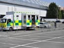 An empty drive-through testing station in the car park at Ashton Gate Stadium in Bristol, where one of seven mass vaccination centres will open next week