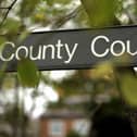 A dozen possession cases went to Wigan’s county court between July and September
