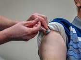 A Covid-19 vaccine being given