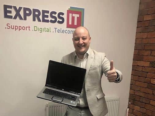 Adam Vause of Express IT who is recycling second hand laptops and tablets for schoolchildren without them