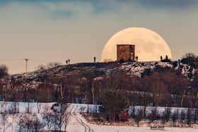 Ian's stunning shot of the moon rising behind Billinge Hill