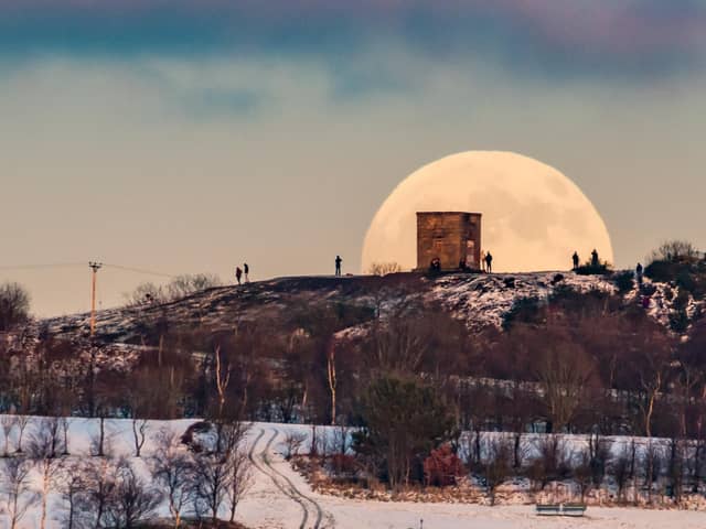 Ian's stunning shot of the moon rising behind Billinge Hill