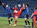 Will Keane in the act of scoring what was almost the winning goal for Latics