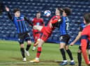 Will Keane in the act of scoring what was almost the winning goal for Latics