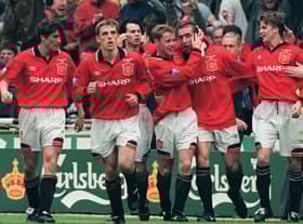 United celebrate Eric Cantona's late FA Cup final winner in 1996