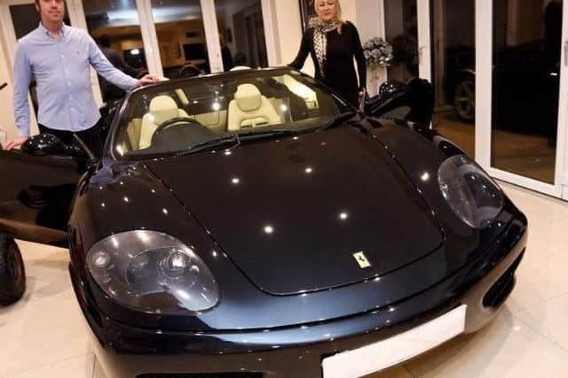 Jennifer Matthews and her husband David are raffling off their Ferrari as part of the package
